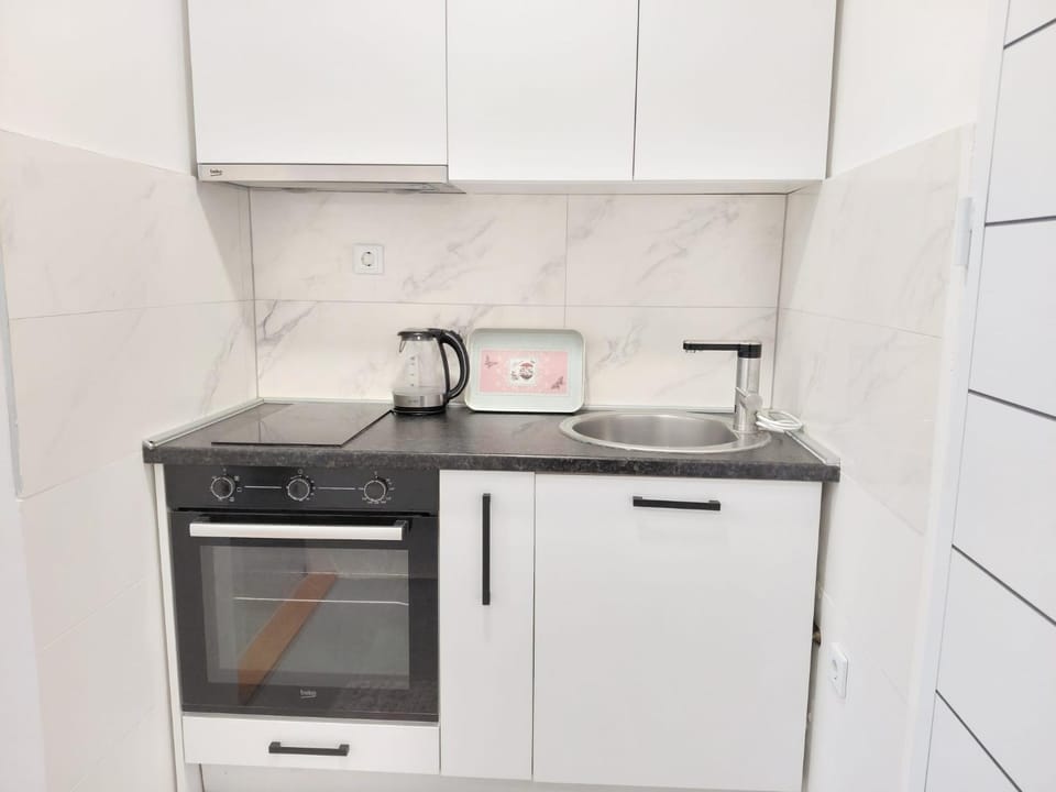 Kitchen or kitchenette, stove