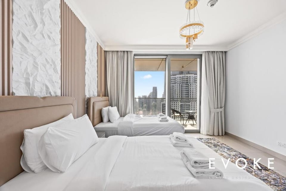 Luxury 2BR by Evoke Burj & fountain View w Sofa bed & Balcony Apartment in Dubai