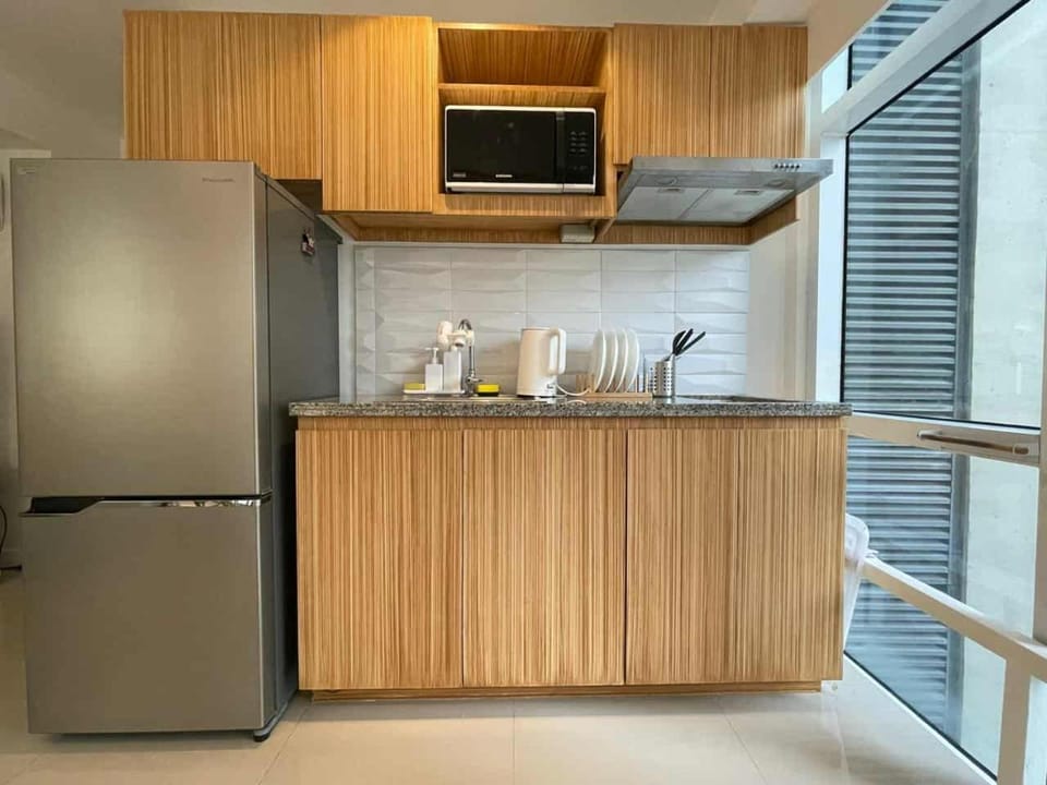 Spacious 1BR Loft with Flex Room in BGC Apartment hotel in Makati