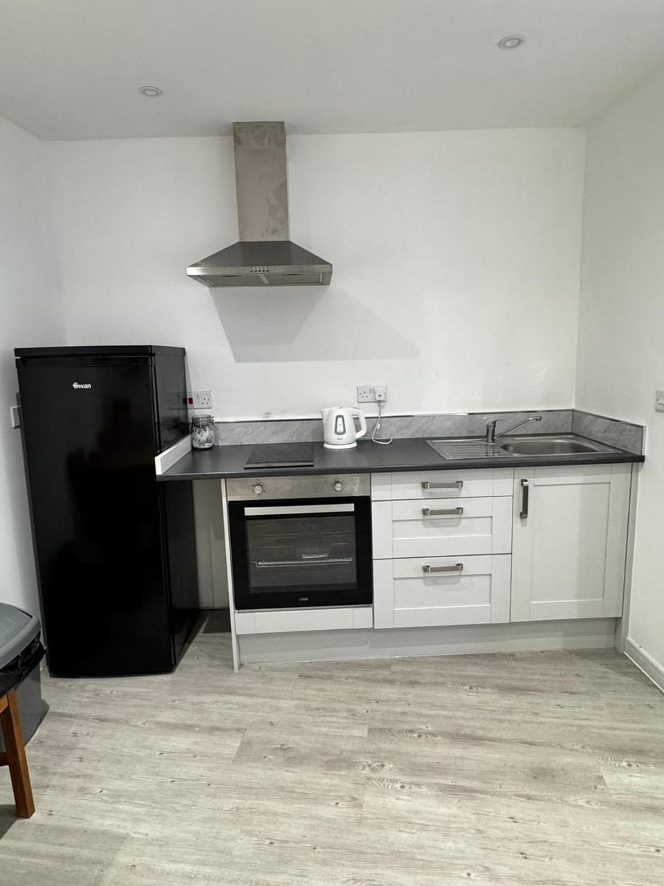 Kitchen or kitchenette, oven, stove