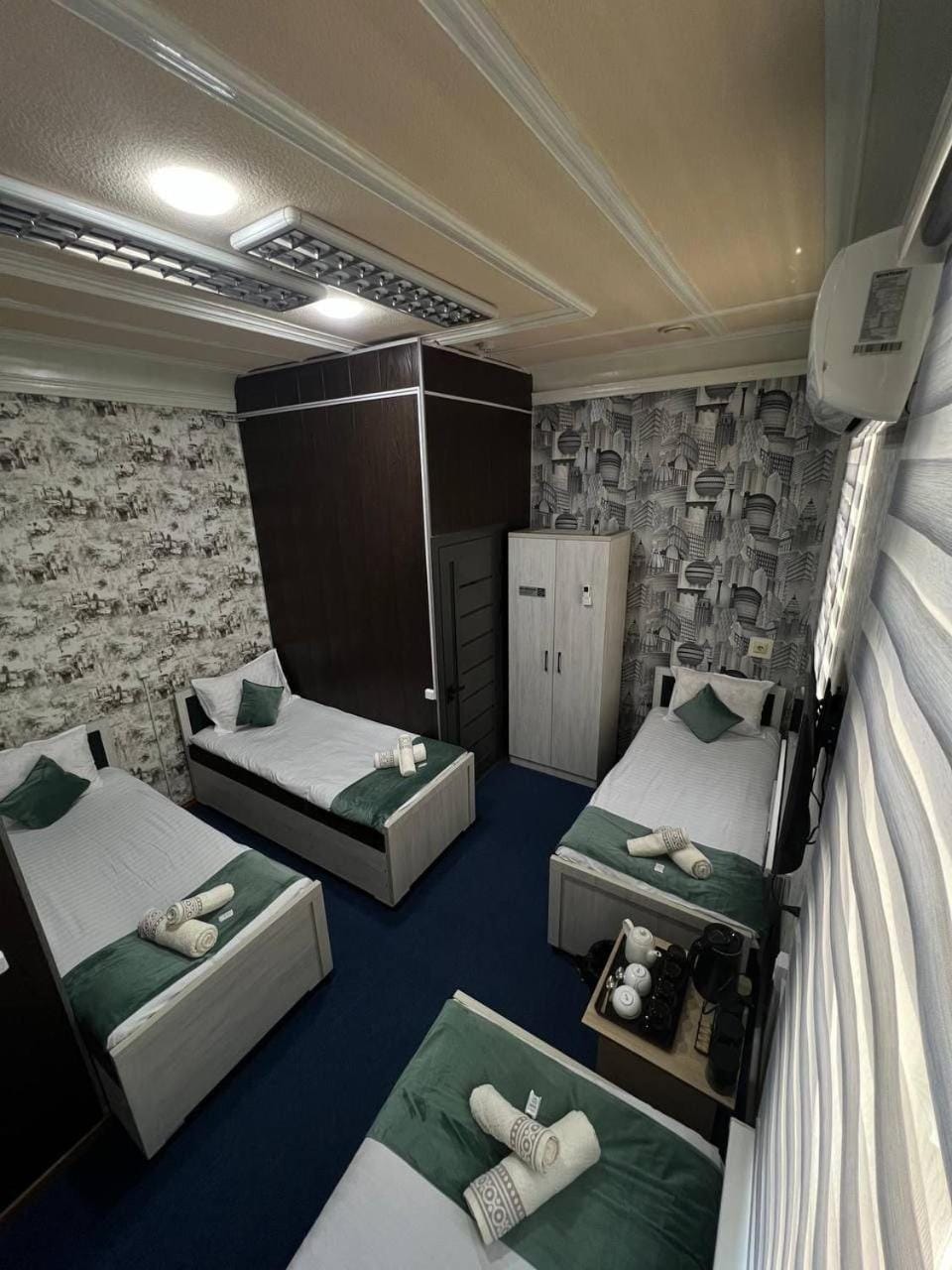 Bed, Photo of the whole room, towels, air conditioner