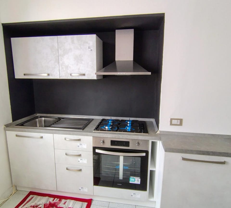 Kitchen or kitchenette, oven, stove
