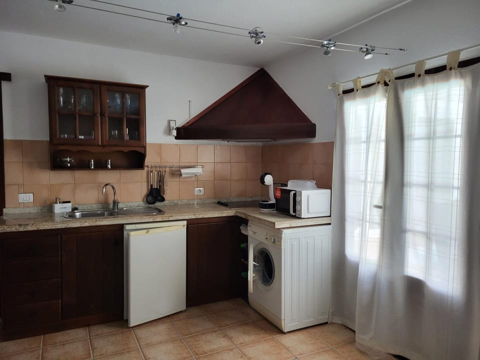 Kitchen or kitchenette, stove, toaster
