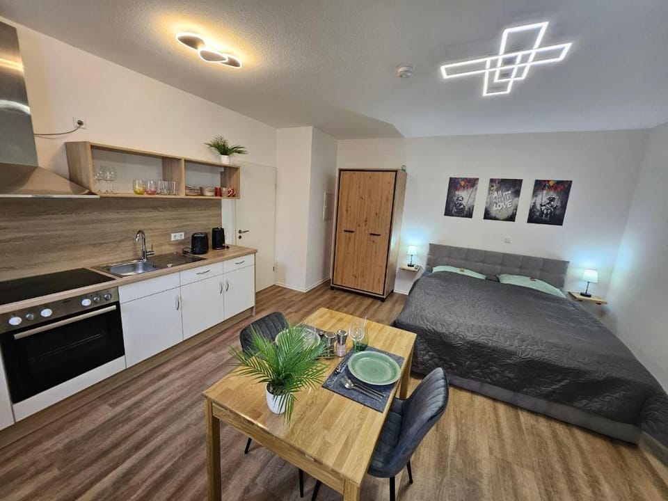 Bed, Kitchen or kitchenette, Photo of the whole room, Dining area, stove