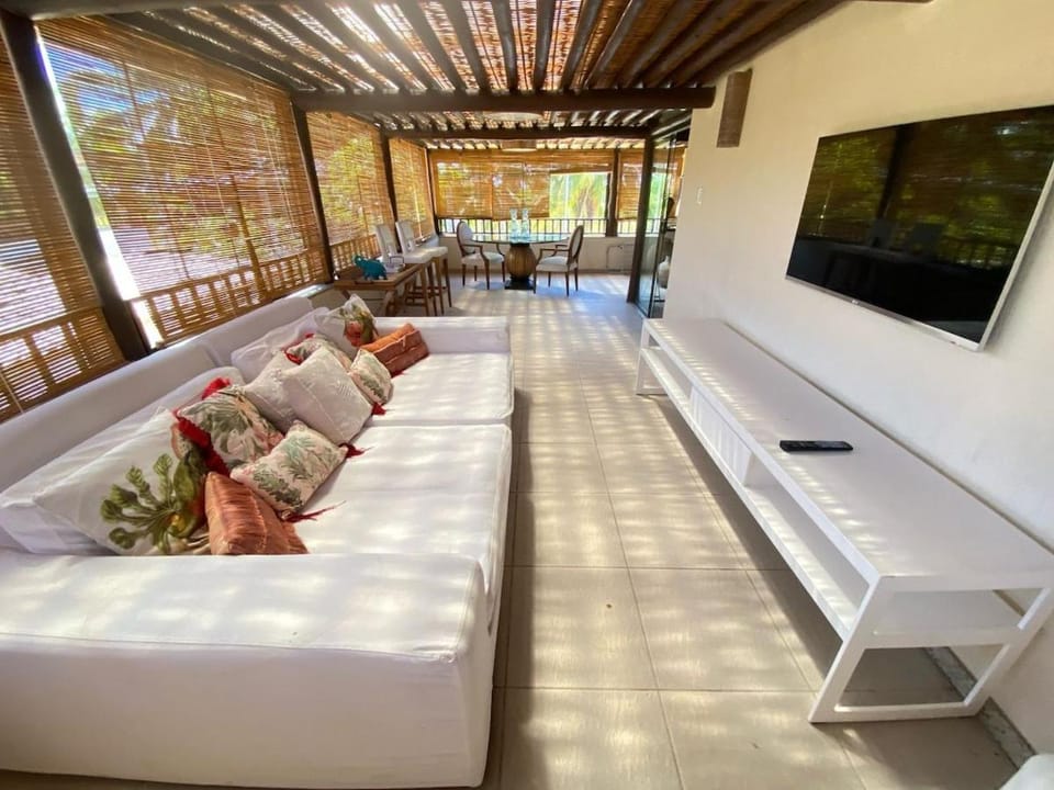 Duplex 3 quartos com acesso a praia ao lado da Vila Apartment in Praia do Forte