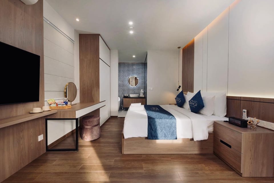 Bed, TV and multimedia, Living room, Seating area, Bedroom, wardrobe