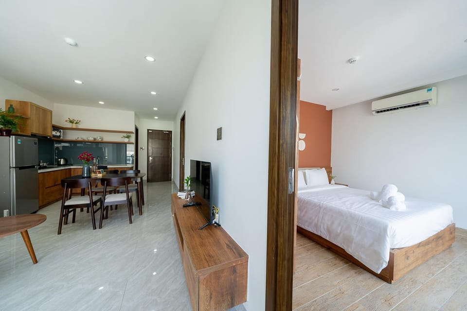 Bed, TV and multimedia, Kitchen or kitchenette, Living room, Photo of the whole room, Seating area, Dining area, Bedroom, stove, kitchen, air conditioner