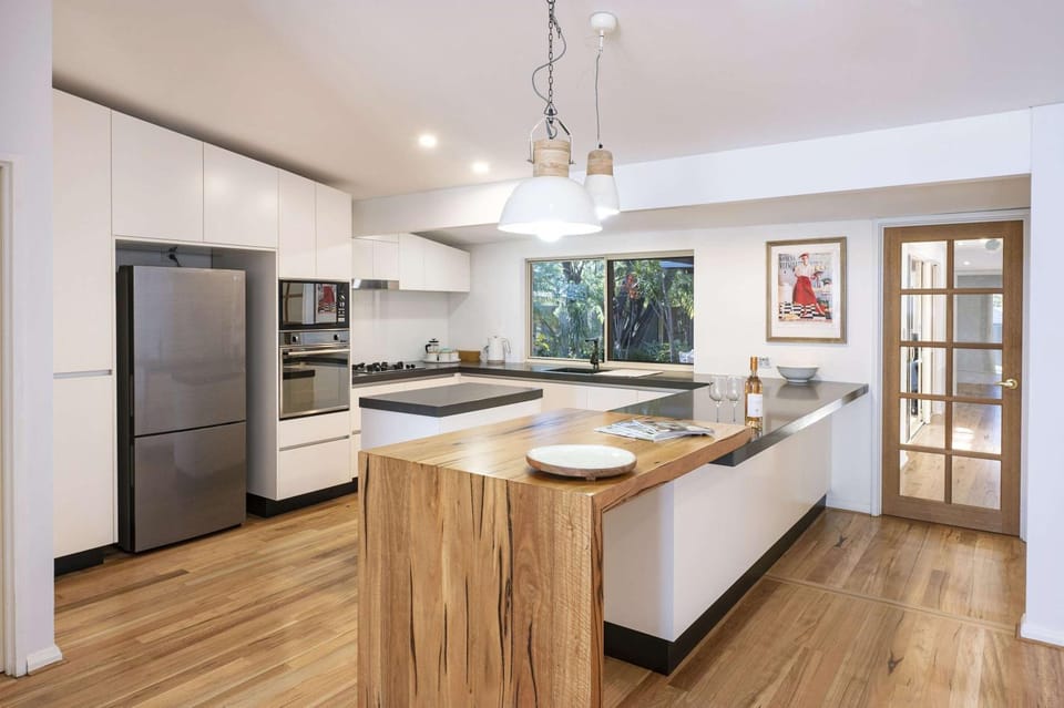 Kitchen or kitchenette, dishwasher, oven, stove