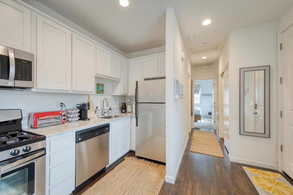 Kitchen or kitchenette, dishwasher, oven, stove, toaster