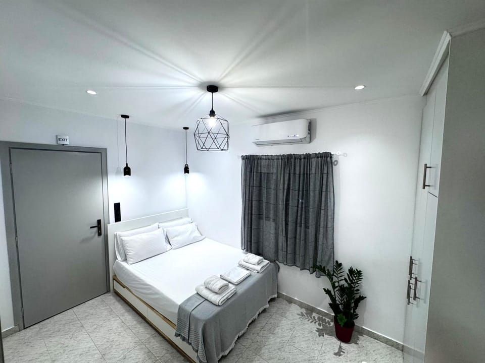 Bed, Photo of the whole room, Bedroom, towels, wardrobe, air conditioner