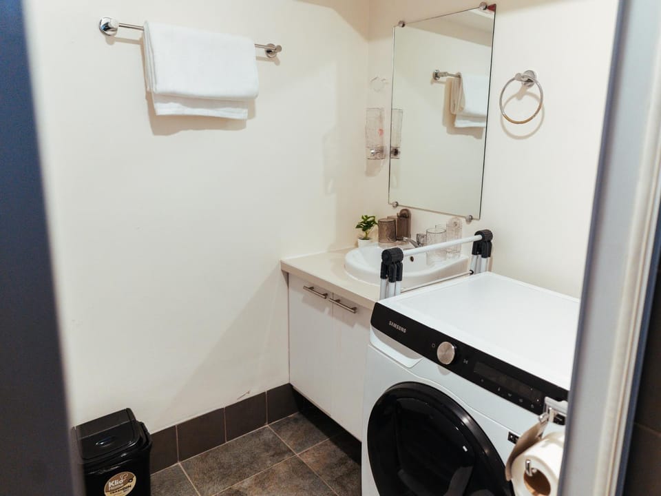Bathroom, towels, washing machine, dryer