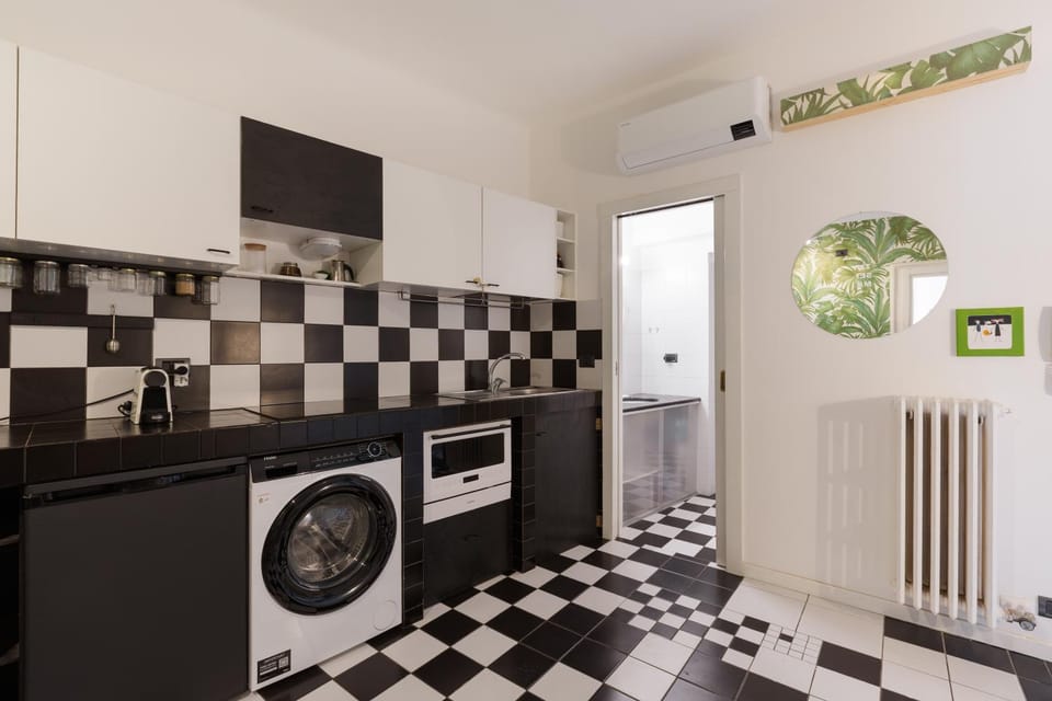 Kitchen or kitchenette, dishwasher, stove, washing machine