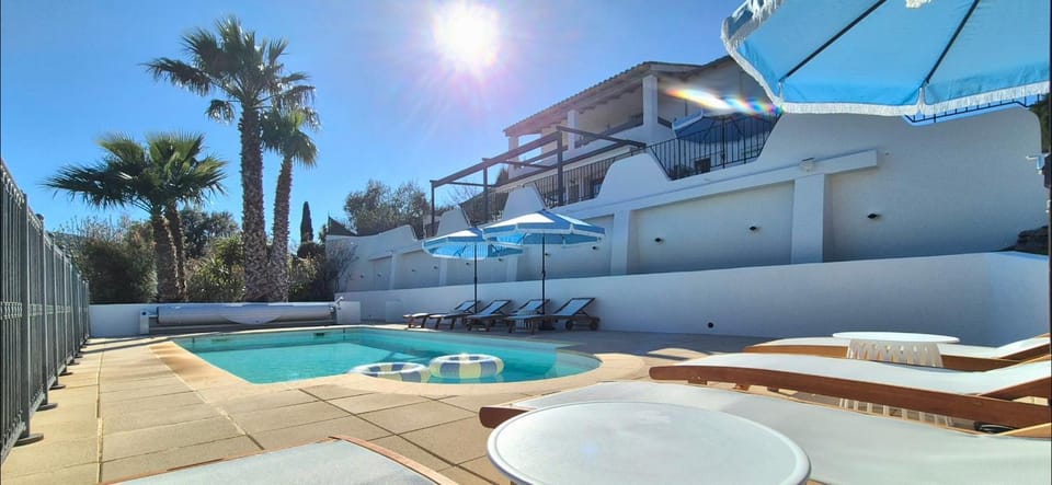 Patio, Natural landscape, Pool view, Swimming pool, sunbed