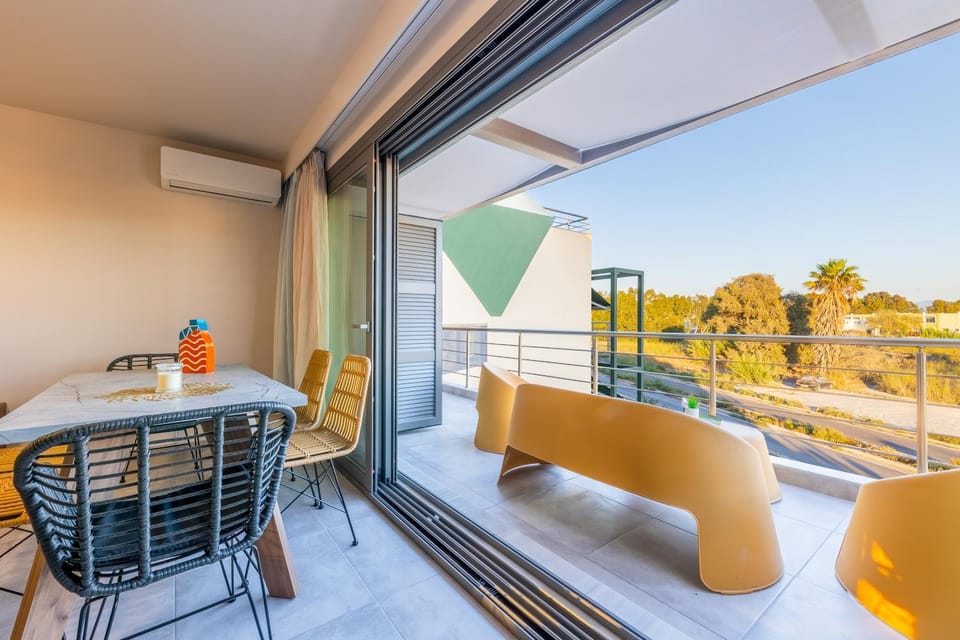 Day, View (from property/room), Balcony/Terrace, Living room, Seating area, Dining area, air conditioner