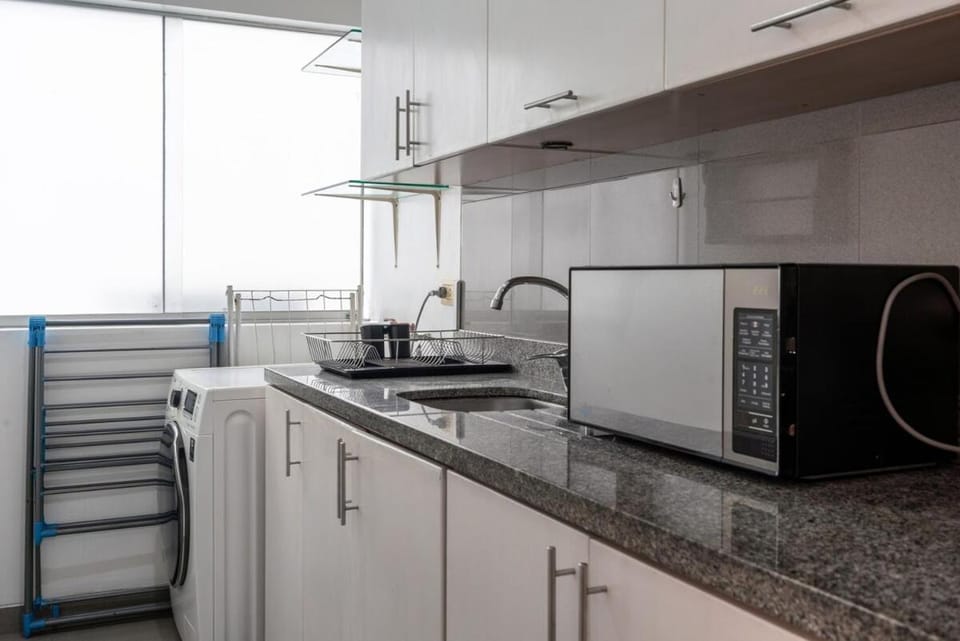 Kitchen or kitchenette, microwave