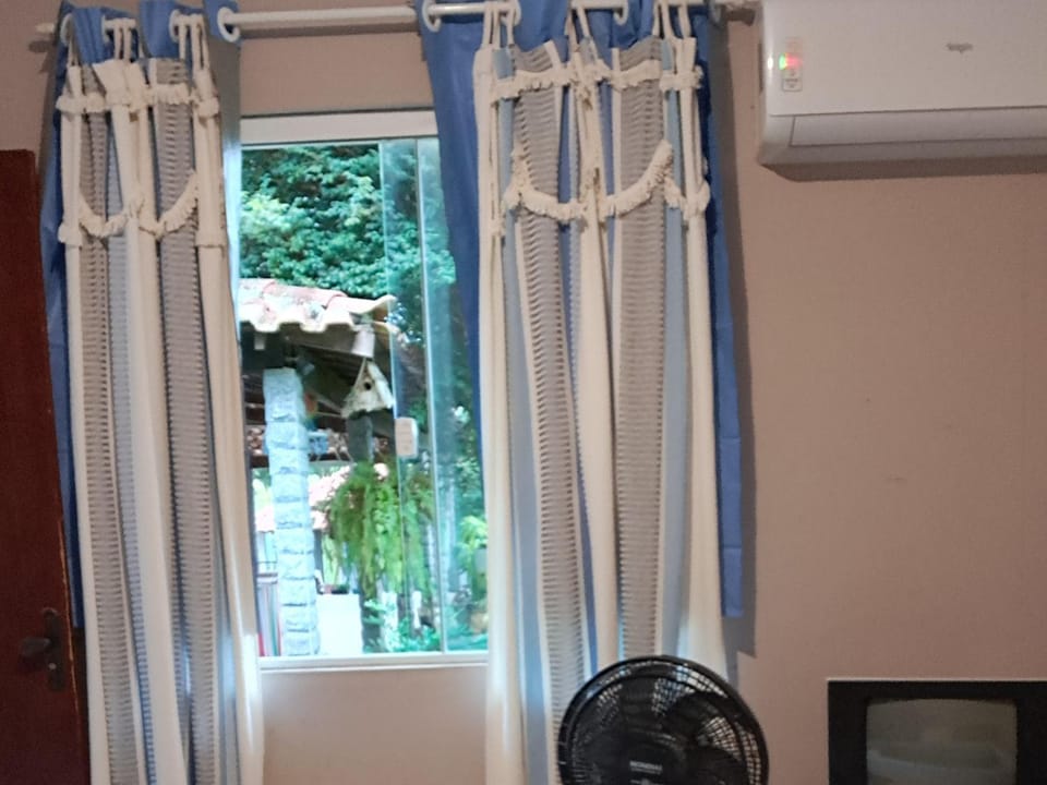 Quarto aconchegante Recanto do Sossego Saquarema Bed and Breakfast in Saquarema