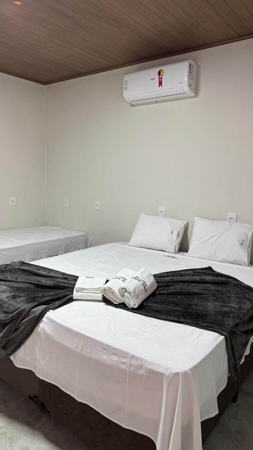 Bed, towels, air conditioner