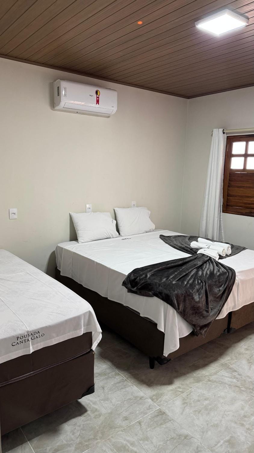 Bed, Photo of the whole room, Bedroom, towels, air conditioner