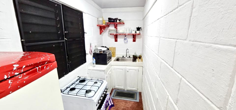 Kitchen or kitchenette, oven, stove, toaster