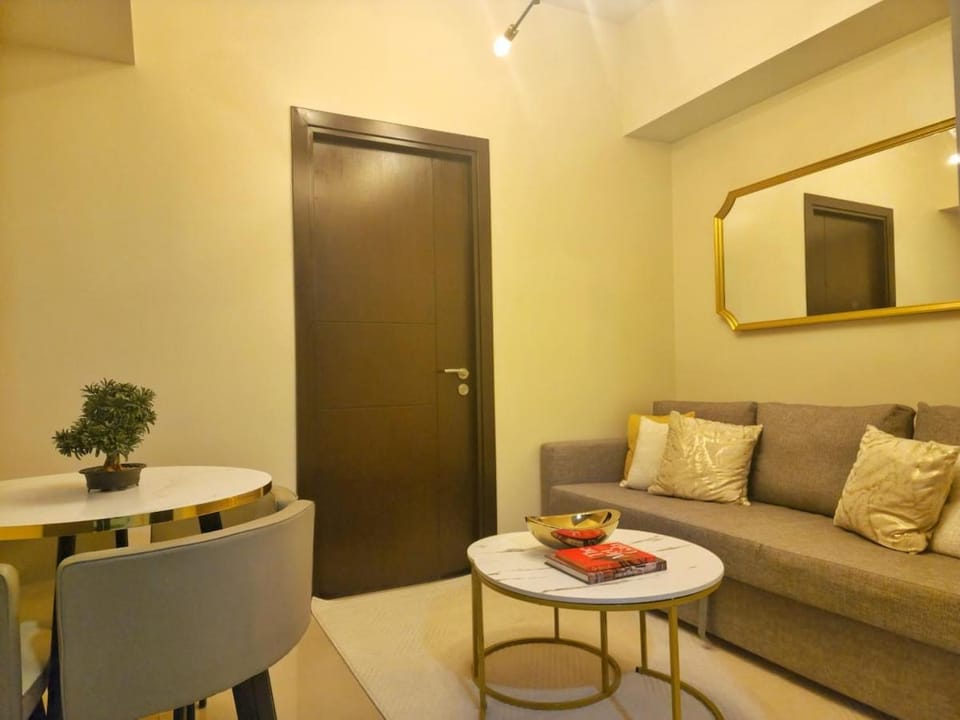 Your Stylish City Escape in Park Mckinley West with Breathtaking Views Apartment in Makati