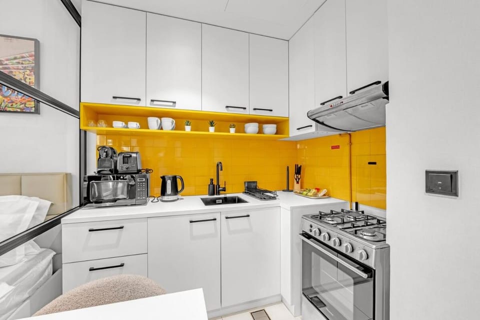 Waves - Cozy & Modern JVC Escape With Pool & Gym Access Apartment in Dubai