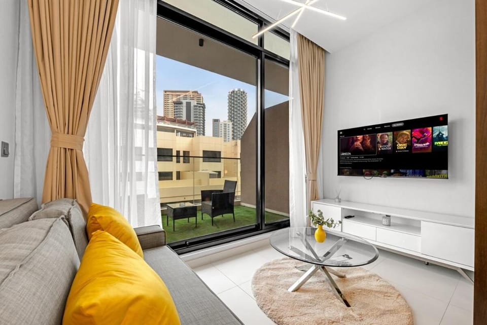 Waves - Cozy & Modern JVC Escape With Pool & Gym Access Apartment in Dubai