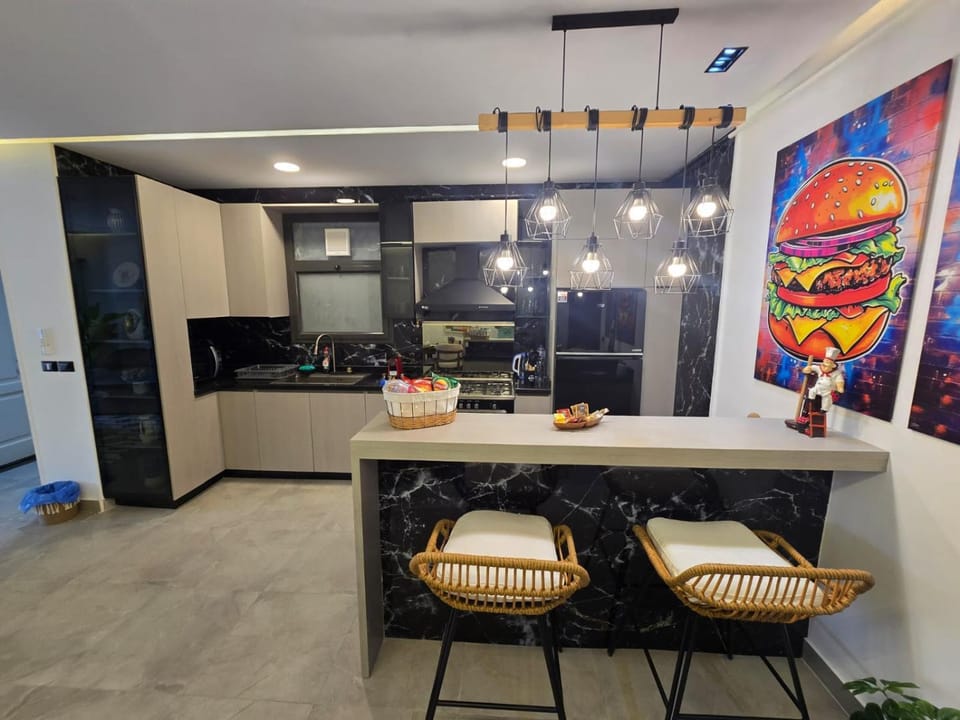 Kitchen or kitchenette, oven, stove