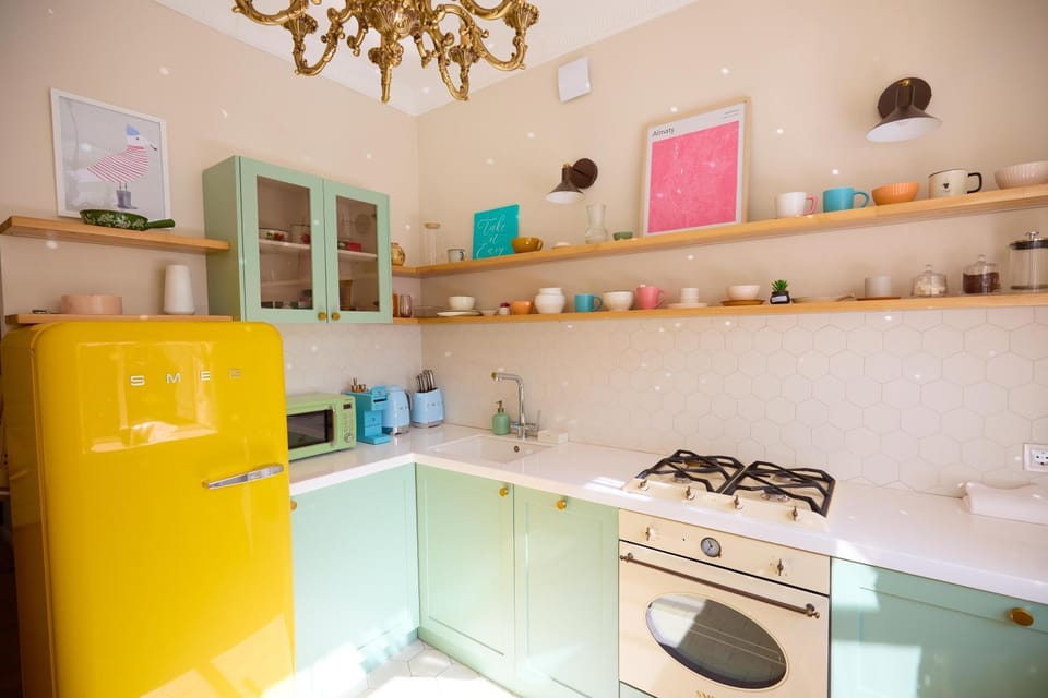 Kitchen or kitchenette, dishwasher, oven, stove, washing machine