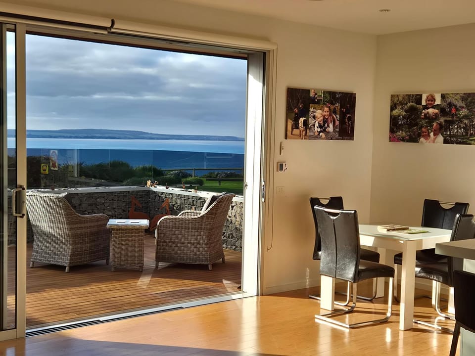 Property building, Patio, Natural landscape, Dining area, Sea view