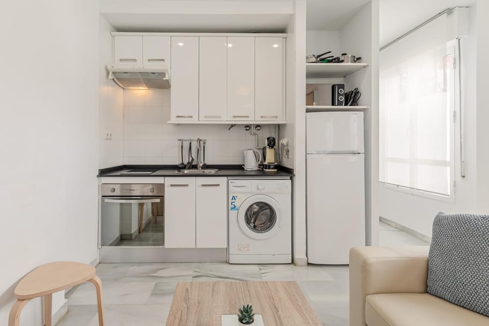 Kitchen or kitchenette, stove, washing machine