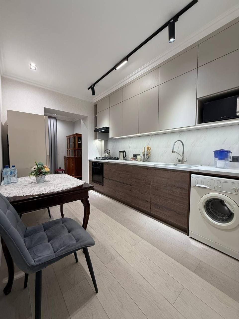 Kitchen or kitchenette, Seating area, Dining area, dishwasher, oven, stove, washing machine, dryer