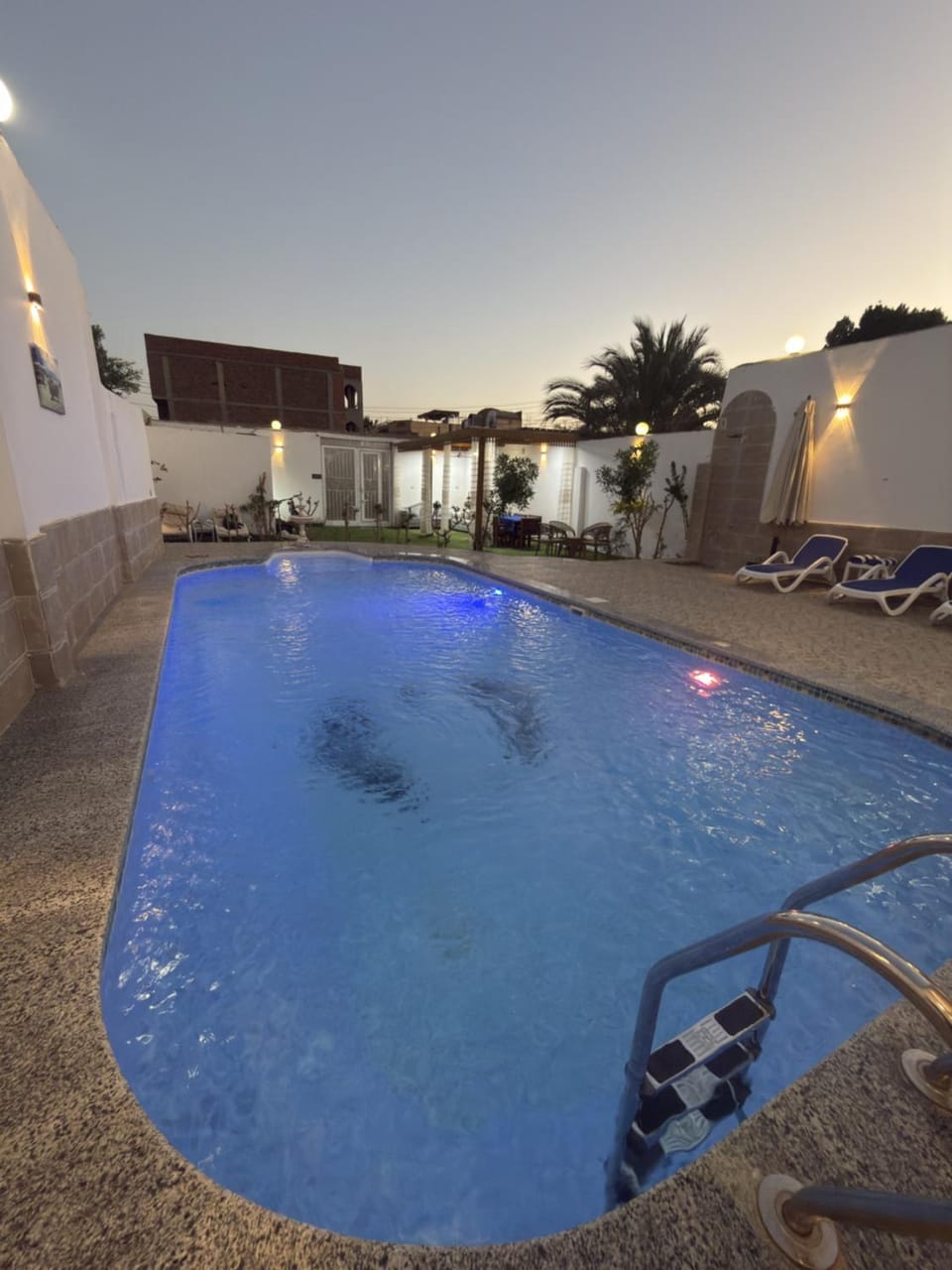 Night, Pool view, Swimming pool, sunbed