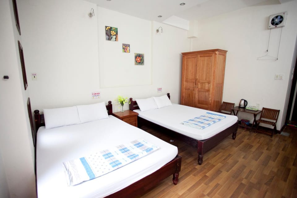 Bed, towels, wardrobe