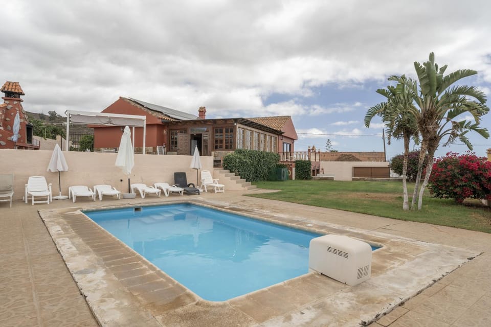 Property building, Living room, Swimming pool