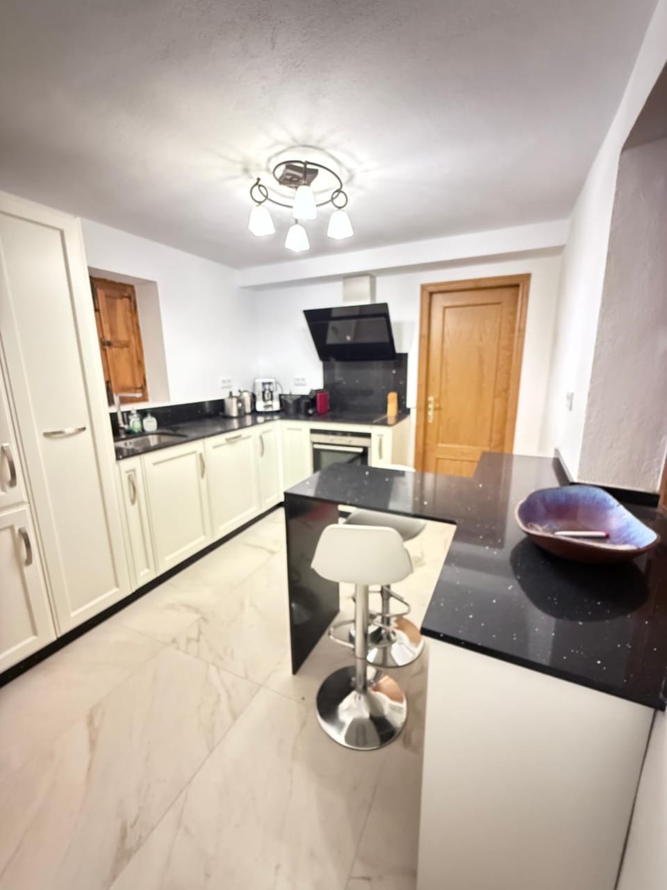 Kitchen or kitchenette, oven, stove
