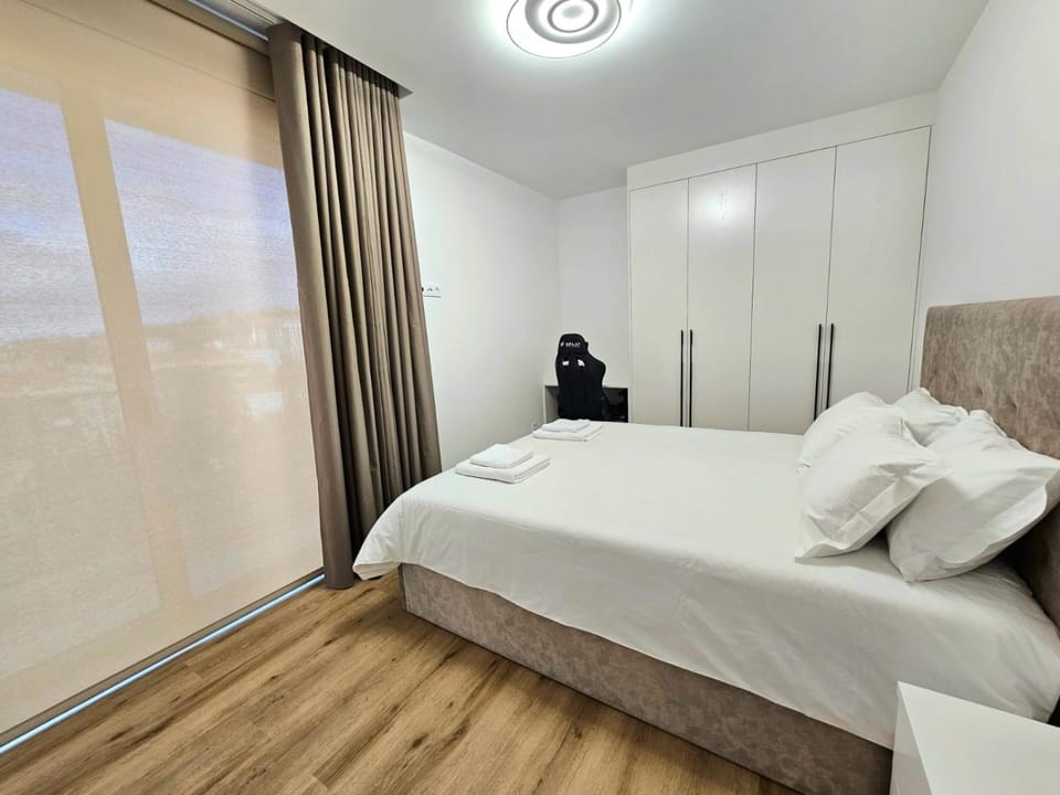 Property building, Bed, Seating area, Bedroom, wardrobe