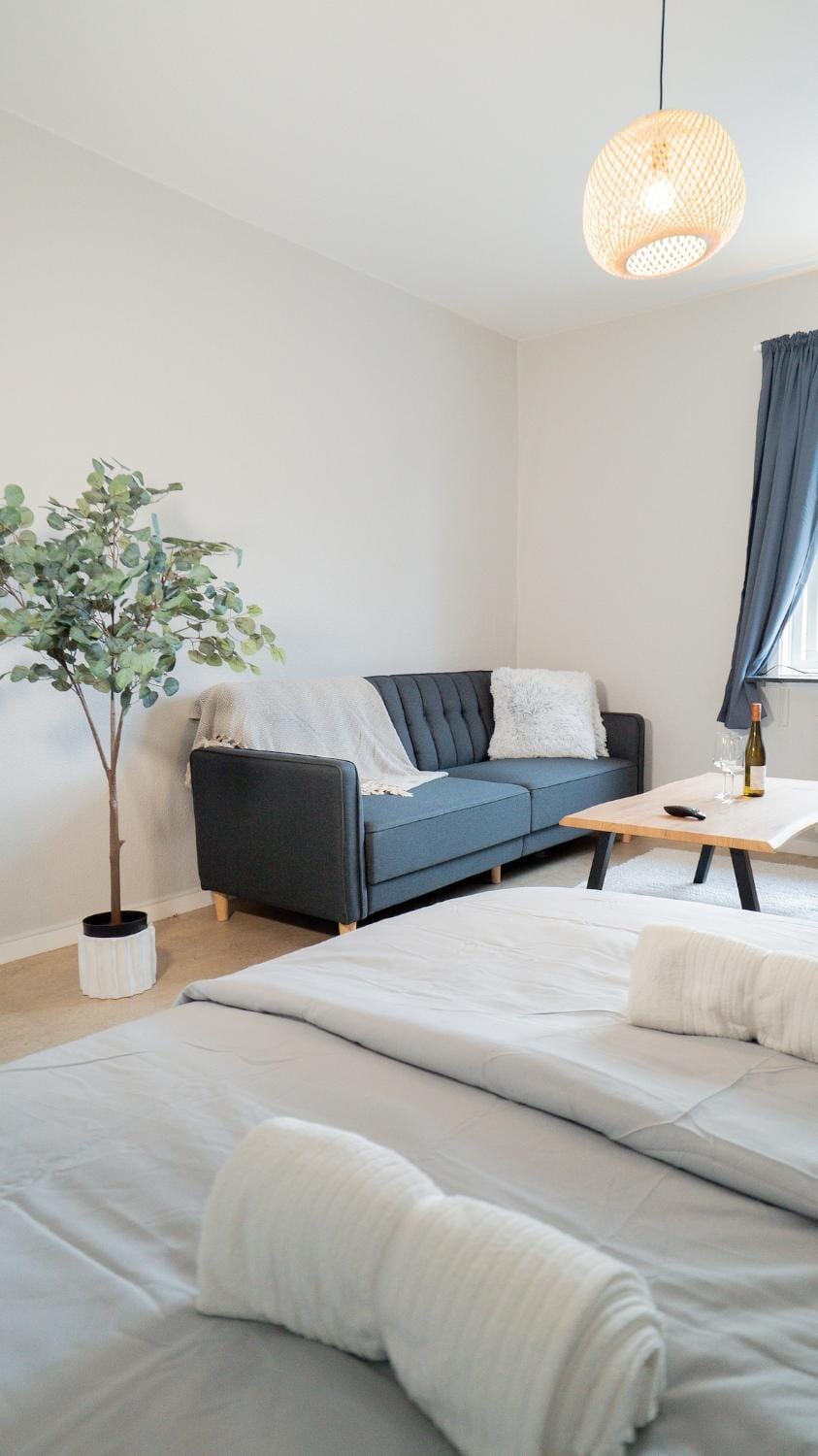 Bed, Living room, Seating area, Bedroom