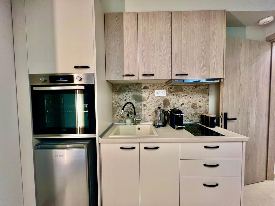Kitchen or kitchenette, oven, stove