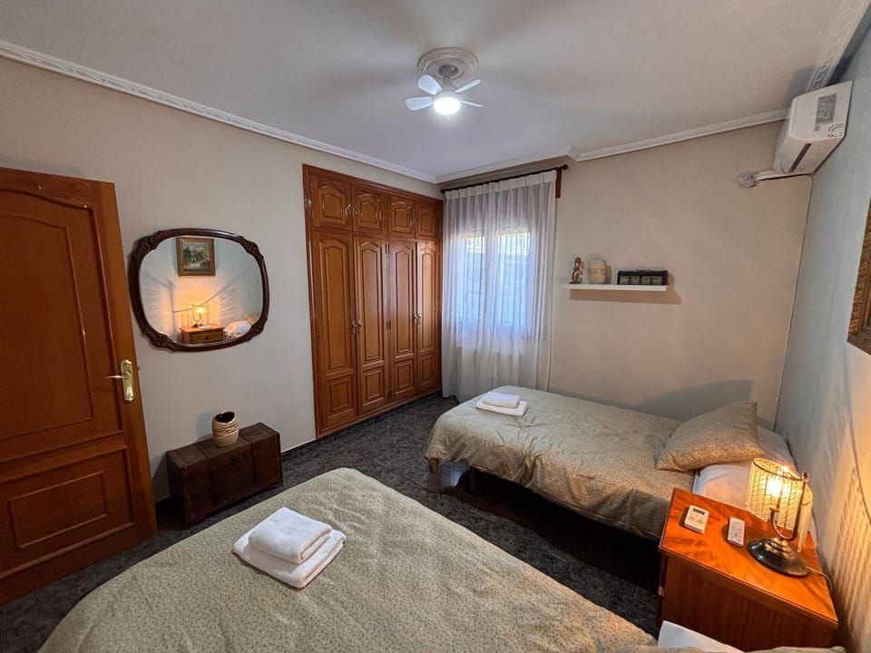 Bed, Bedroom, towels, wardrobe, air conditioner