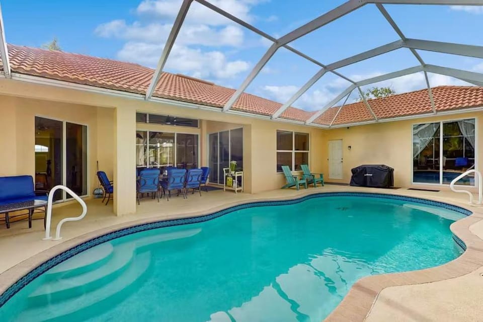 Waterfront Bliss with Heated Pool, Private Dock & Gulf Access - Lotus Cove House in Cape Coral