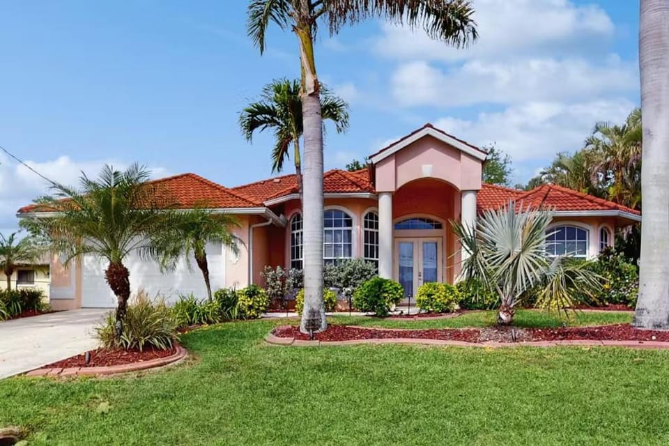 Waterfront Bliss with Heated Pool, Private Dock & Gulf Access - Lotus Cove House in Cape Coral