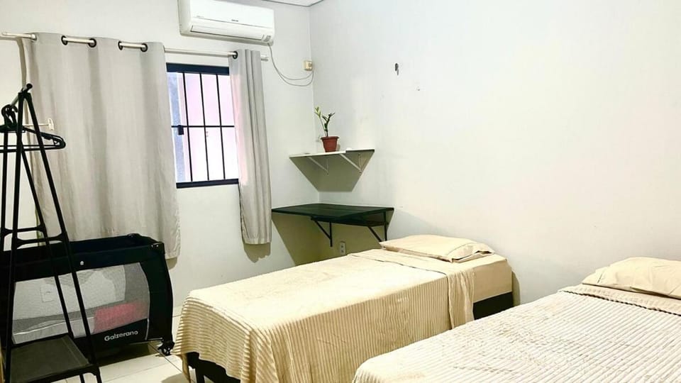 Bed, air conditioner