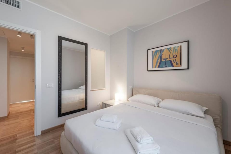 Bedroom, towels, wardrobe, air conditioner
