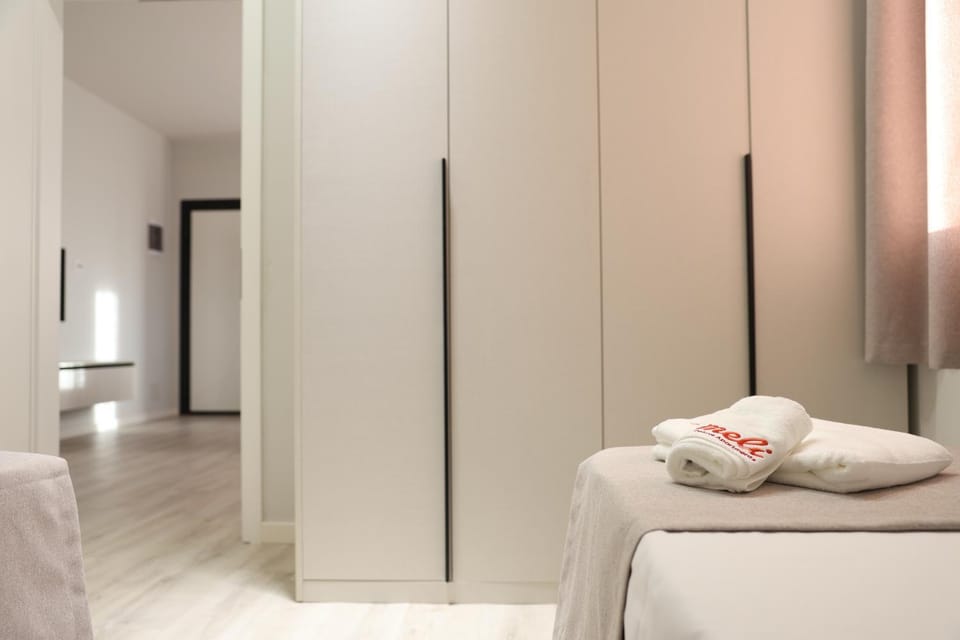 Bed, Living room, Photo of the whole room, Seating area, Bedroom, towels, wardrobe