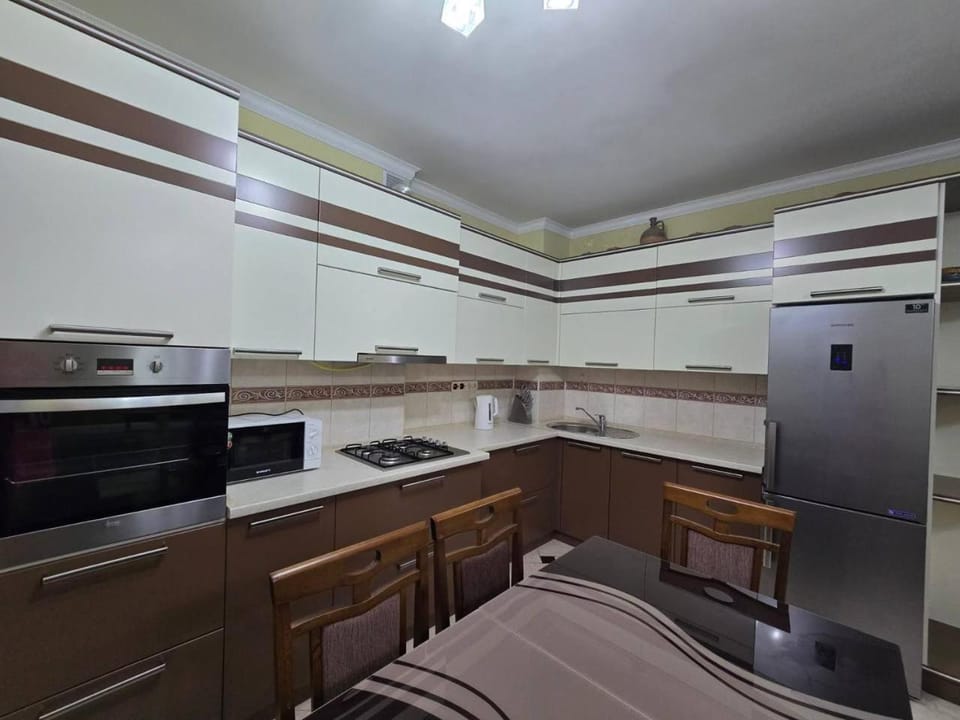 Kitchen or kitchenette, oven, stove