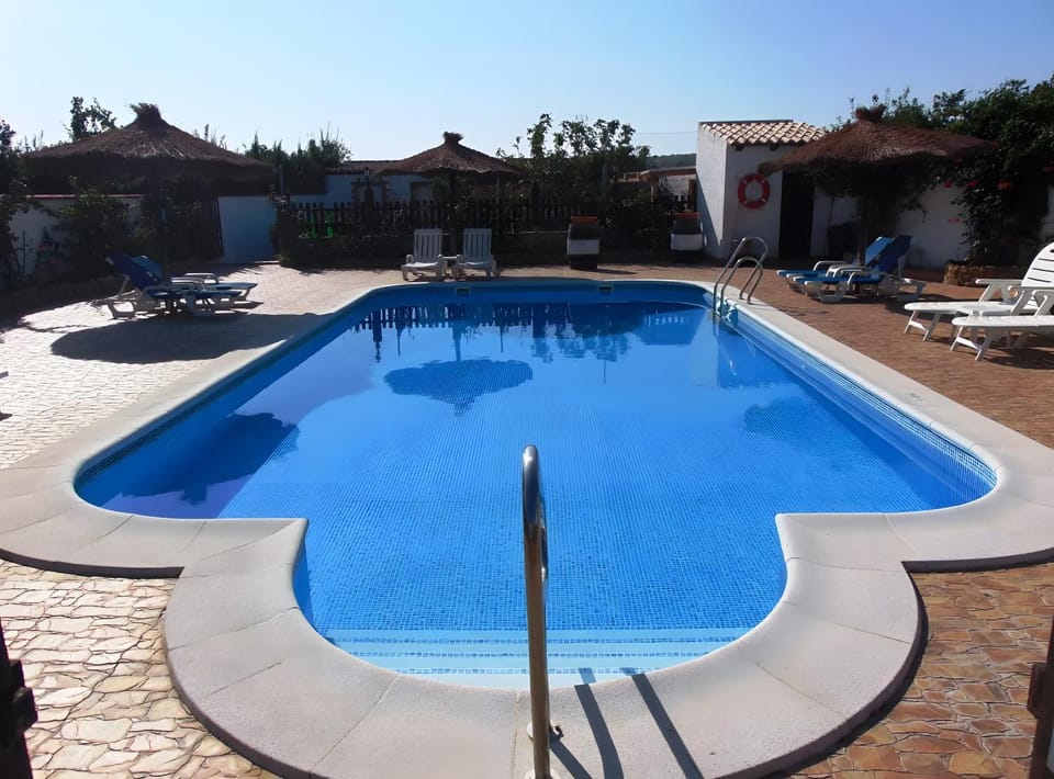 Property building, Living room, Swimming pool