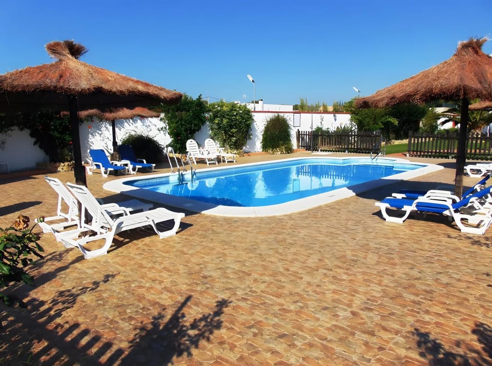 Property building, Living room, Swimming pool