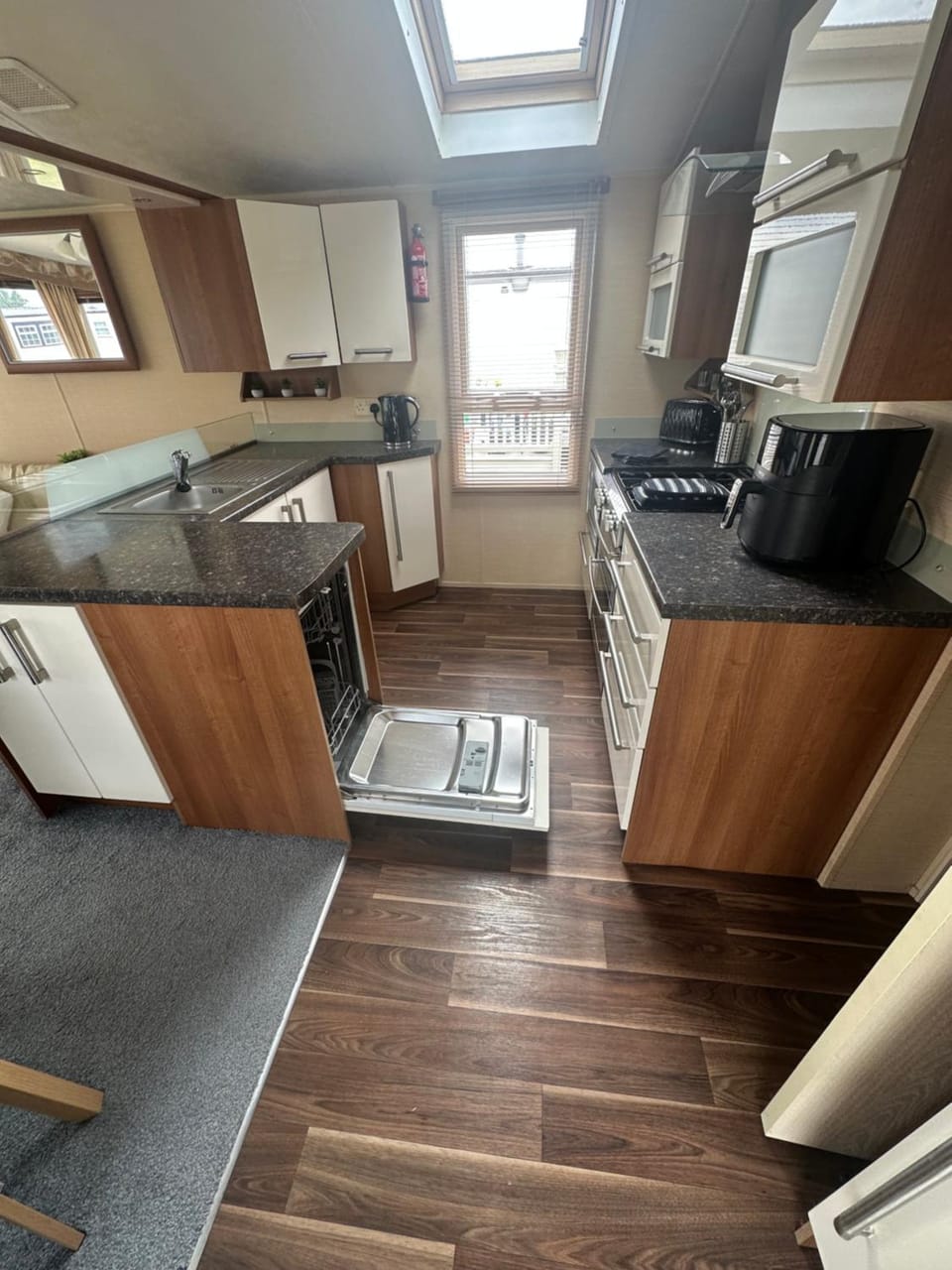 Kitchen or kitchenette, Dining area, dishwasher, oven, stove, toaster