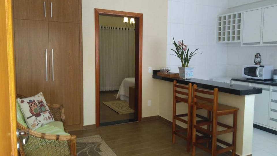 Coffee/tea facilities, Kitchen or kitchenette, Photo of the whole room, Dining area, Bedroom, microwave, minibar, wardrobe