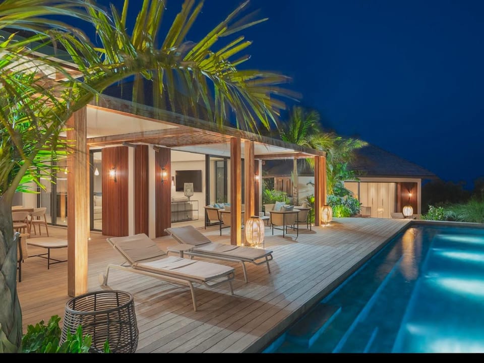 Property building, Patio, Night, Natural landscape, Pool view, Swimming pool, sunbed
